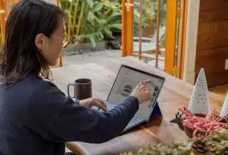 a woman using a laptop