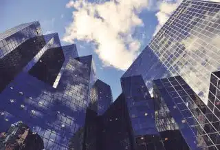 low angle photo of curtain wall building