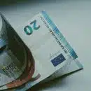 5 euro bill on white table